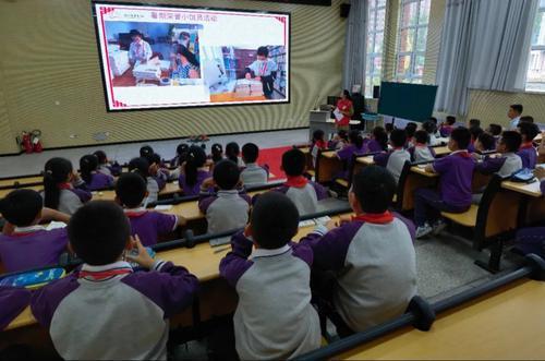 民族团结一家亲童心共筑中国梦银川市图书馆共享读书乐主题教育进校园